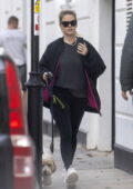 Alice Eve stays cozy in a black jacket, sweater and leggings while out  walking her dog in Chelsea, London-041023_7