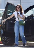 Lucy Hale opts for a classic white tee and blue jeans while heading to a birthday party in Studio City, California