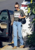 Miley Cyrus keeps it casual in a tee and jeans while out shopping with some friends in Highland Park, California