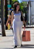 Noah Cyrus dons a white maxi dress while out shopping with her fiancé Pinkus in Los Angeles