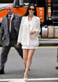 Anne Hathaway puts on a leggy display in a white mini dress with matching blazer during a promo run in New York City