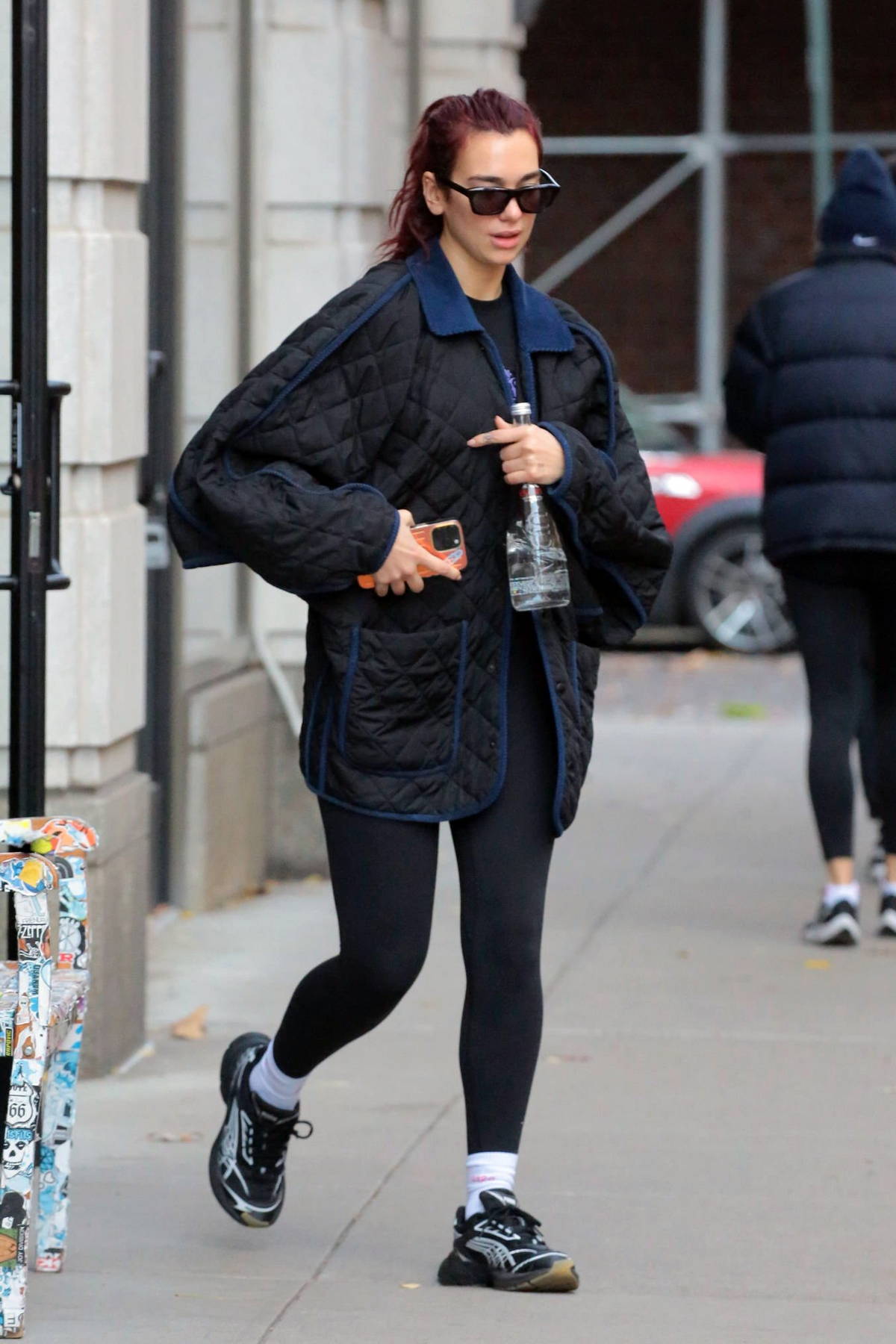 Dua Lipa dons a black quilted jacket and leggings while out for an early  morning workout in New York City