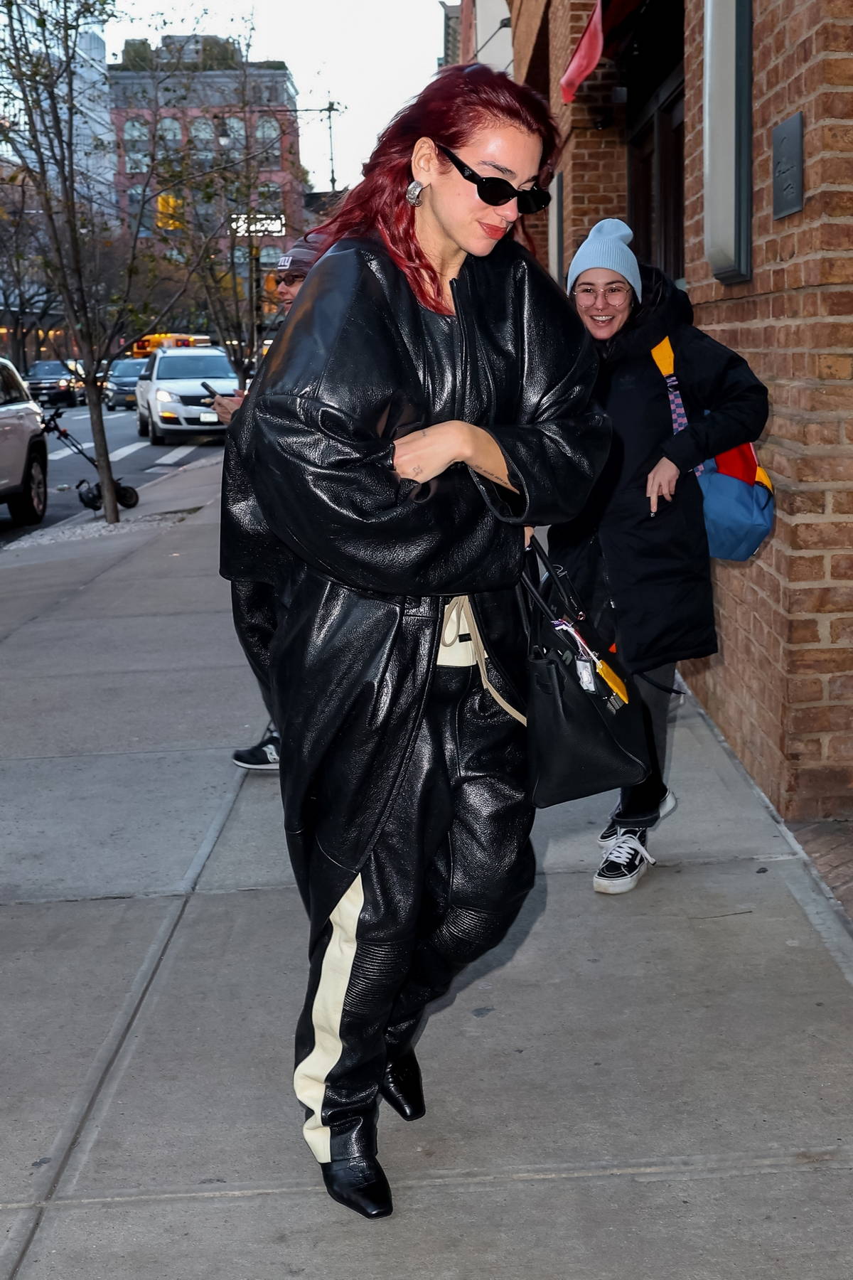 Dua Lipa Wears Oversized Leather Jacket and Pants in New York City