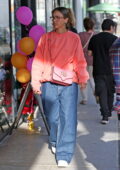 Jessica Alba wears an oversized sweatshirt and baggy denim while out shopping in Beverly Hills, California