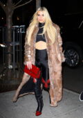 Jessica Simpson keeps it stylish in fur coat as she checked into her hotel in New York City