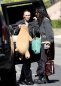 Lily-Rose Depp carries her teddy bear while seen arriving at a house with girlfriend 070 Shake in Los Angeles