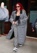 Megan Fox looks stylish in a grey long coat while heading out of her hotel in New York City