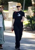 Olivia Wilde showcases her incredible physique in a tiny sports bra and  leggings while leaving the