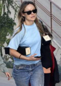 Olivia Wilde opts for a casual look in a blue tee and jeans while stepping out in Los Angeles