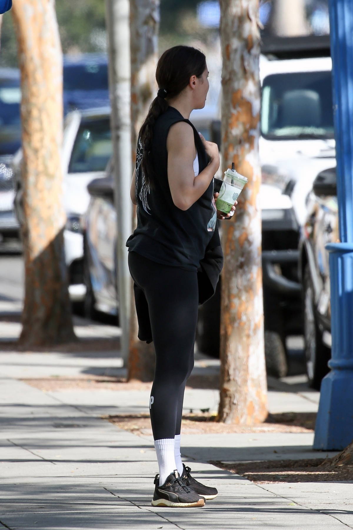 Adriana Lima displays her fit physique in a black tank top and leggings  while out for a workout in Beverly Hills, California-281223_9