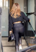 Jennifer Lopez flaunts her famous curves in cropped black sweater