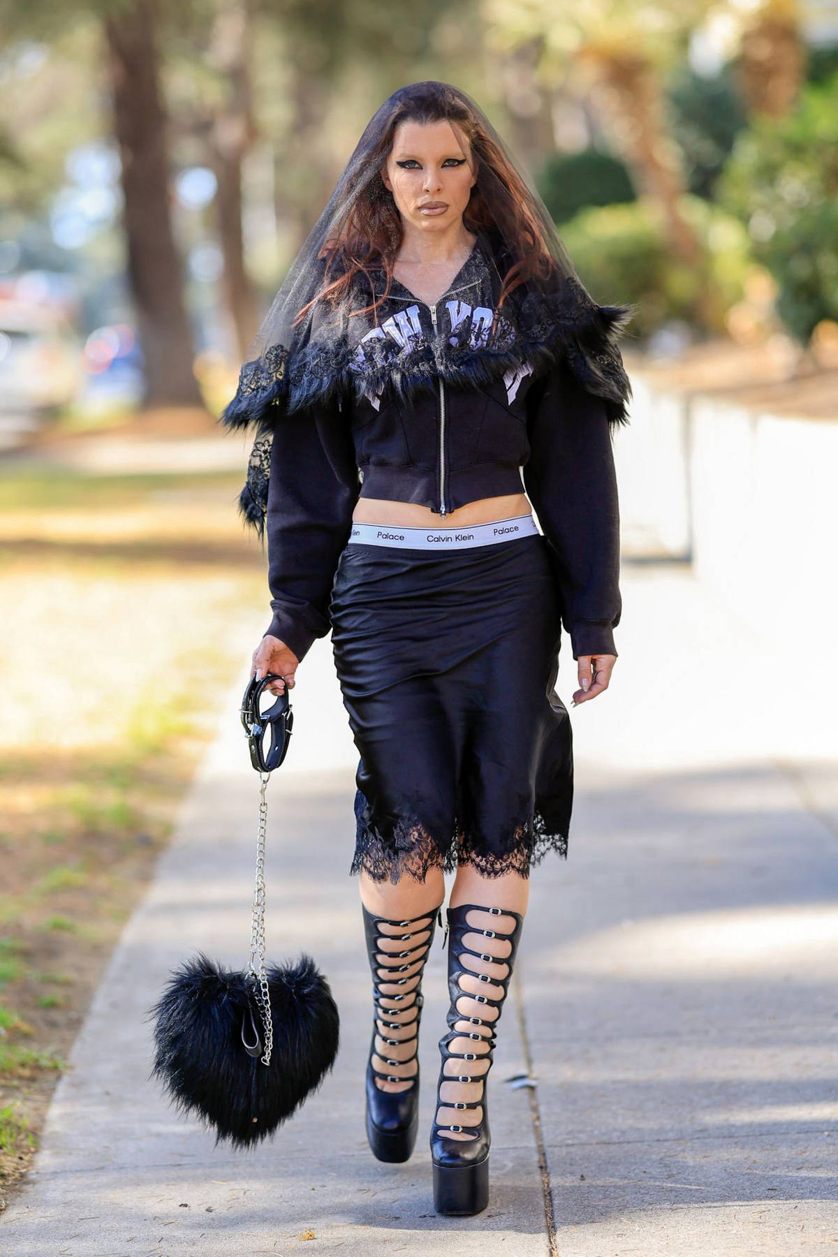 Ella Rose displays her slim figure in a crop top and leggings while out on a
