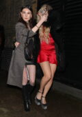 Lottie Moss puts on a leggy display in a red mini dress during a night out at the Chiltern Firehouse in London, UK