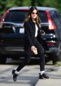 Lucy Hale stays cozy in a black coat and leggings while out running a few errands in Los Angeles