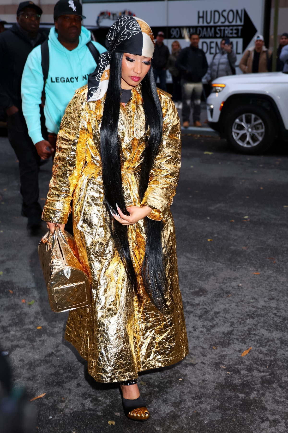 Nicki Minaj dazzles in gold as she arrives to pre-tape 'Watch What Happens  Live With Andy Cohen' in New York City-111223_8