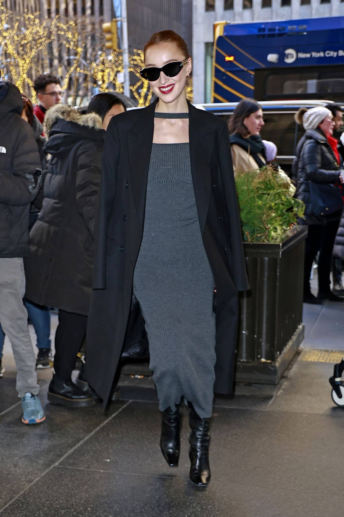 Olivia Wilde rocks a black hoodie and dark grey leggings as she