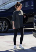 Ashley Benson shows her baby bump in a casual tee and leggings while out with hubby Brandon Davis in Los Angeles