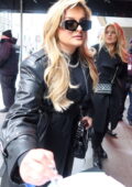 Bebe Rexha dons an all-black ensemble as she arrives at Madison Square Garden with her parents in New York City