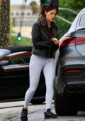 Eiza Gonzalez rocks a leather jacket and grey leggings while stopping for gas in Beverly Hills, California