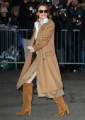 Emma Stone looks stylish in a Louis Vuitton trench coat while seen outside 'Good Morning America' studios in New York City