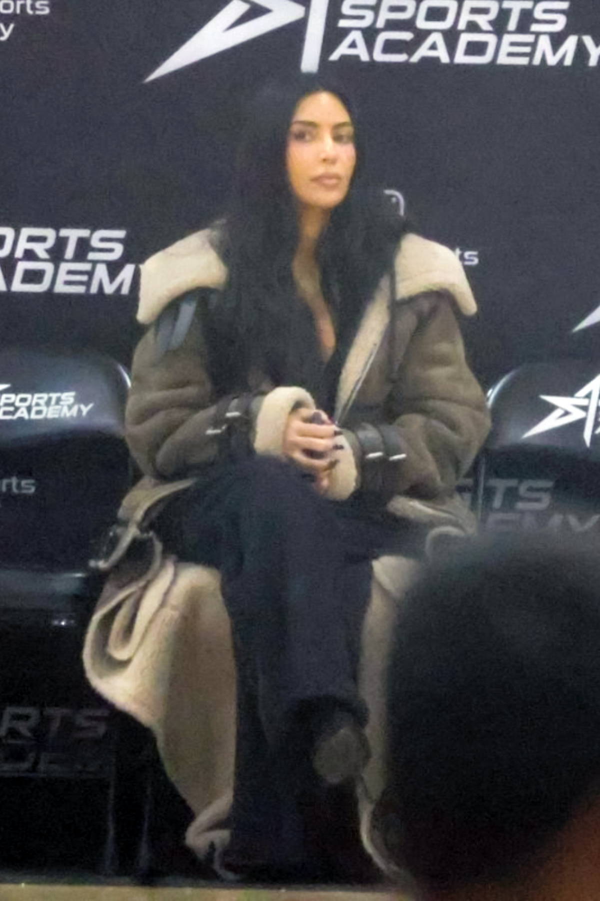 Black Long Kim Kardashian Son Saint's Soccer Game Coat - Jacket Hub