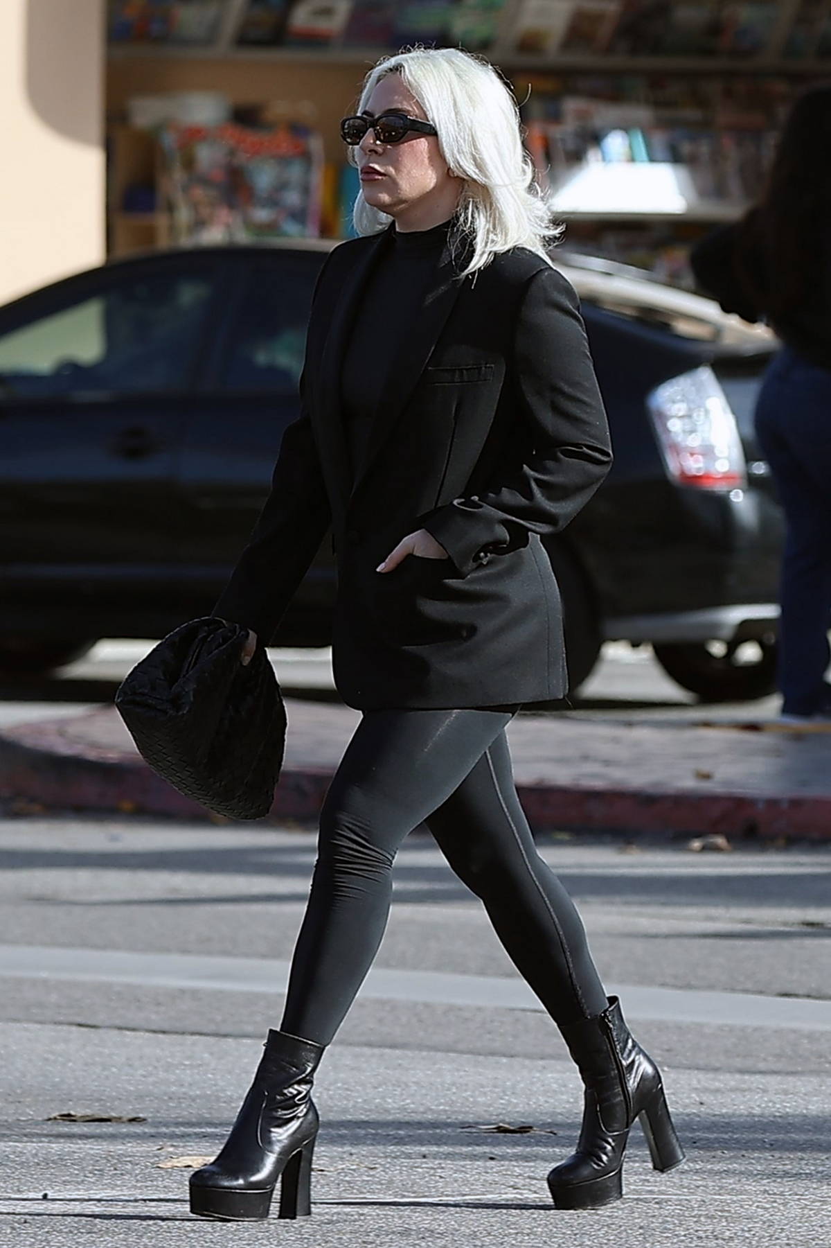 Lady Gaga rocks a black blazer with matching leggings and boots while  spotted leaving French Bakery