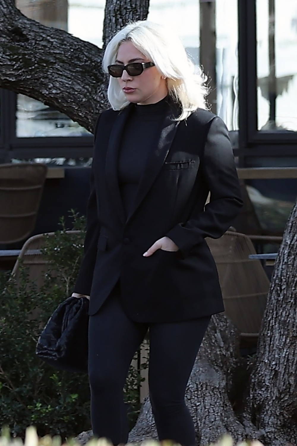 Lady Gaga rocks a black blazer with matching leggings and boots while  spotted leaving French Bakery