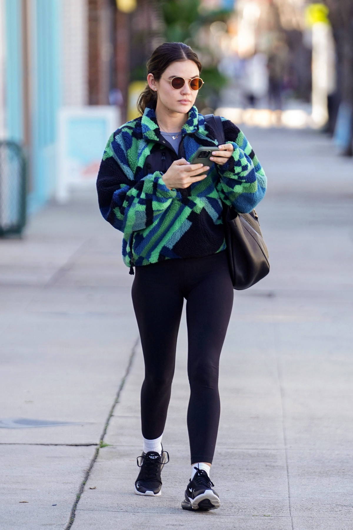Lucy Hale dons heather grey leggings and cropped black sweatshirt while out  for a hike session