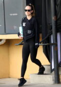 Olivia Wilde wears a black sweatshirt and leggings as she hits the gym for her daily workout in Studio City, California