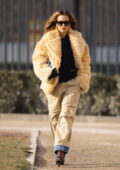 Rita Ora looks fashionable in beige fur coat with Dsquared2 sweater as she arrives at Loulou restaurant in Paris, France