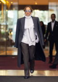 Rita Ora puts on a stylish display while heading for the Dior fashion show in Paris, France