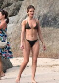 Rosie Huntington-Whiteley showcases her stunning figure in an olive green bikini during a beach day in Phuket, Thailand