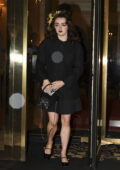 Maisie Williams wears a black blazer with matching dress while heading out in Paris, France