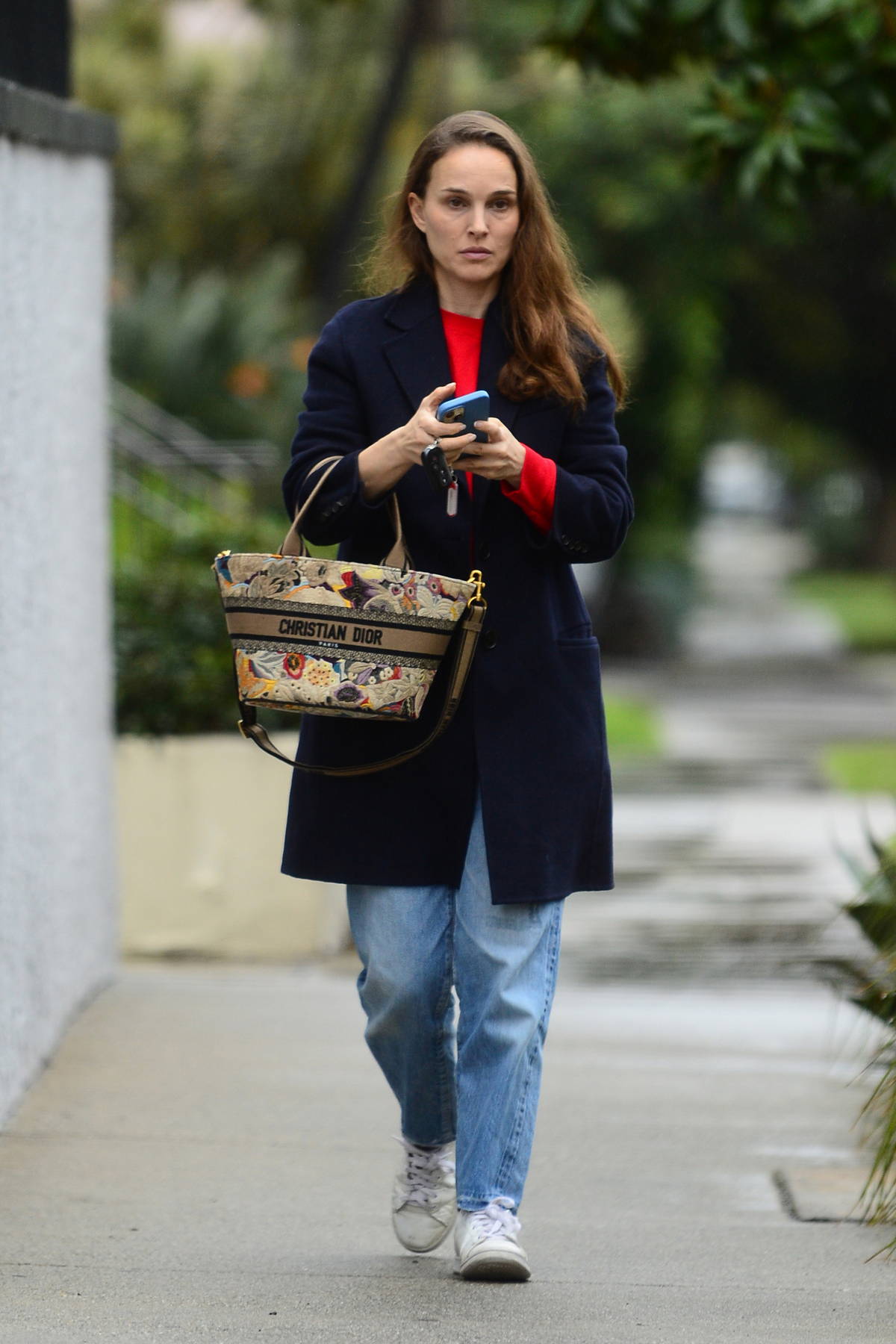 Natalie Portman opts for a makeup free look while stepping out for dinner with a friend in Los Angeles