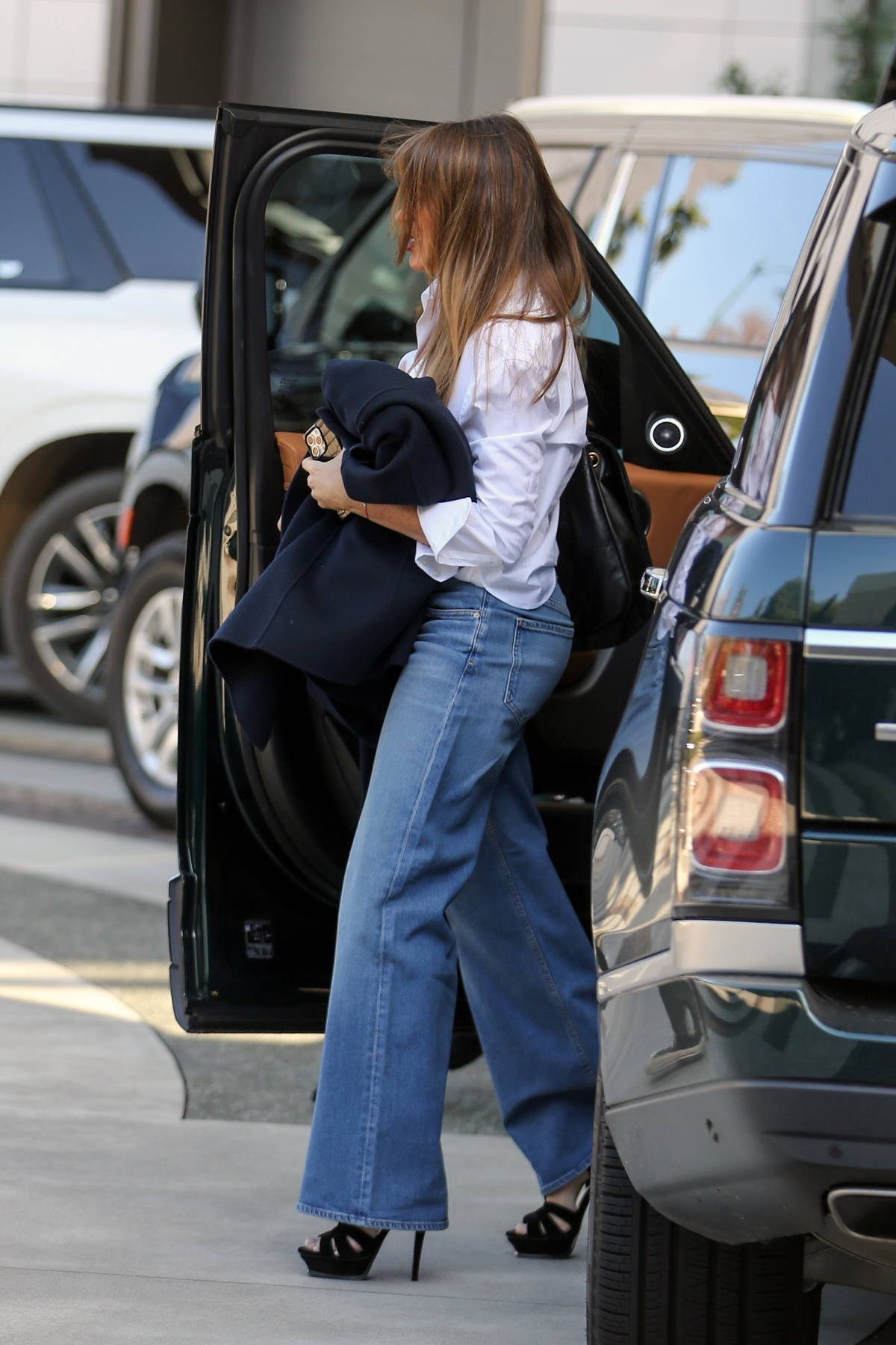 Sofia Vergara wears a white shirt and blue jeans while attending a meeting  at Wardrobe Hotel in Beverly Hills, California-130224_2