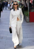 Ashley Roberts looks stylish in a white satin shirt with matching trousers while leaving Heart radio in London, England