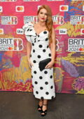 Isla Fisher attends the BRIT Awards 2024 at the O2 Arena in London, England