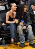 Lily-Rose Depp and 070 Shake attend Los Angeles Lakers vs Minnesota Timberwolves game at Crypto.com Arena in Los Angeles