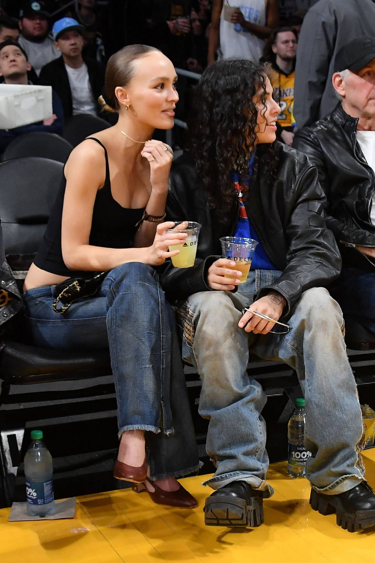 Lily-Rose Depp and 070 Shake attend Los Angeles Lakers vs Minnesota Timberwolves game at Crypto.com Arena in Los Angeles