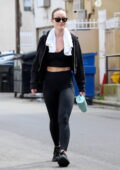 Ali Larter wears a black sweatshirt and leggings with an arm sling while  out for a