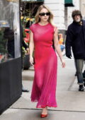 Sydney Sweeney looks striking in a hot pink dress while attending a Bai event in New York City