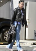 Adriana Lima rocks a leather jacket and jeans while out with beau Andre Lemmers in Los Angeles