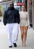 Bianca Censori puts on a racy display in a sheer skintight romper while out on a stroll with Kanye West in Oxnard, California