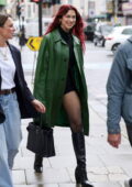 Dua Lipa rocks a green trench coat while out promoting her upcoming new album 'Radical Optimism' in London, England