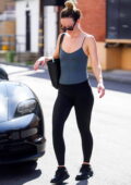 Olivia Wilde shows off her fit figure in a grey tank top and black leggings while she leaves the gym in Studio City, California