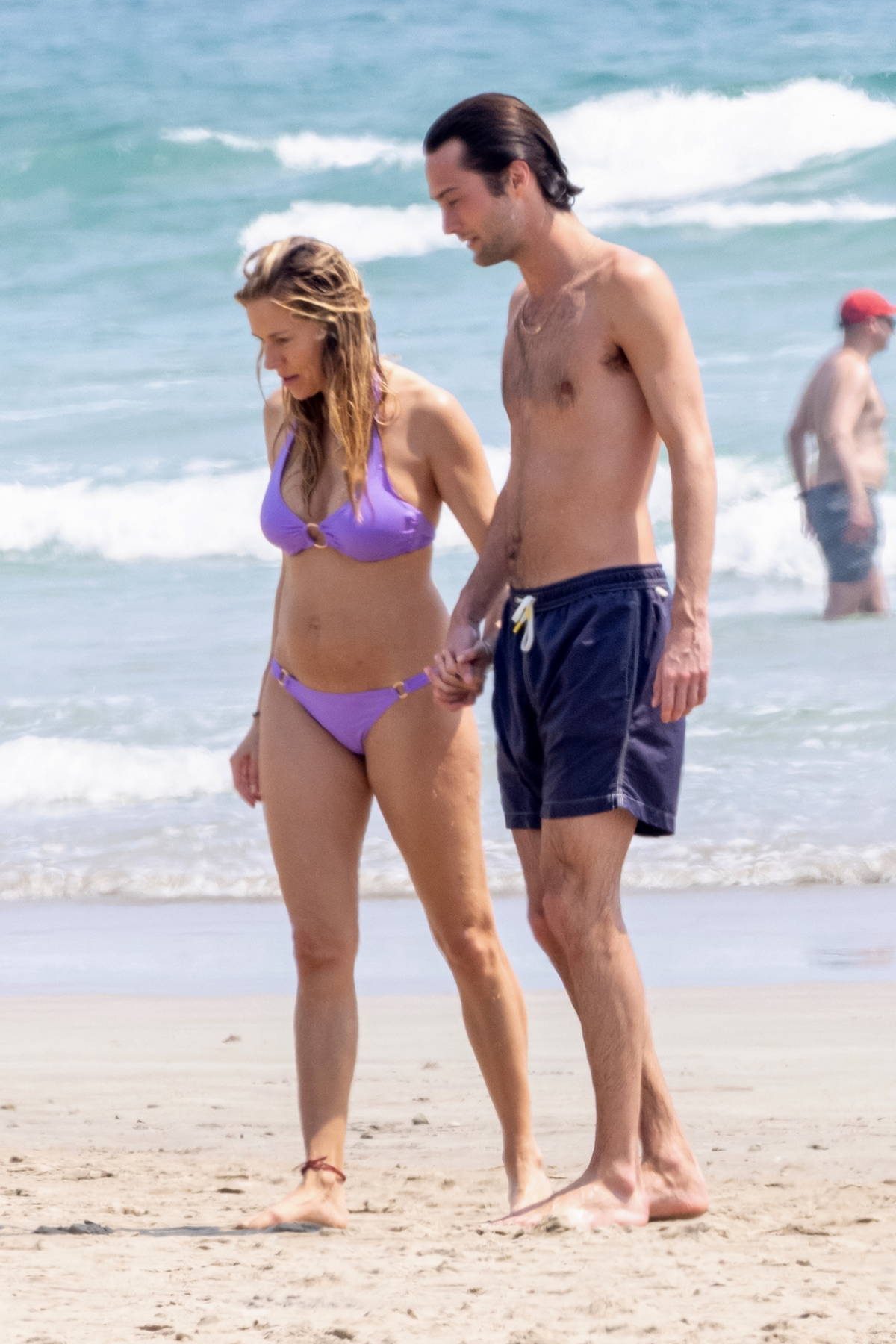 Sienna Miller shows off her bikini body while enjoying a beach day with boyfriend Oli Green in Costa Rica