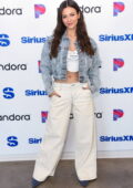 Victoria Justice flashes her toned midriff in a crop top and denim jacket while visiting SiriusXM Studios in Los Angeles