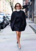 Rita Ora looks stylish in a black cape style mini dress while stepping out in New York City