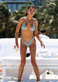 Brooks Nader slips into a baby blue bikini as she hits the beach in Miami, Florida