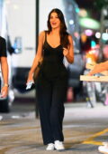 Camila Morrone looks flawless in a black jumpsuit during a dinner date with Noah Sacco at I Sodi in New York City
